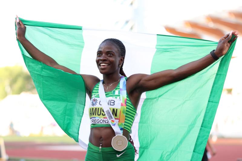 Tobi Amusan is an elegant dark skinned African who has successfully served her country and made her proud. After getting an award during the 2018 Asaba African Championship, while she held the country's flag, she said, "Unknown now, but I will persist till I am Unforgettable," then we have her result.