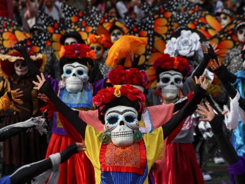 Day of the Dead is celebrated on November 1 and 2, but other days, such as October 31 or November 6, may be included. It's widely observed in Mexico, where it originated, and elsewhere, especially by Mexicans. Even though it is related to the Christian celebrations of Hallowtide, it has a much less sad tone and is seen as a happy holiday rather than a time of mourning. Family and friends gather for the multi-day holiday to remember the dead. These celebrations can be humorous as people recall funny memories of the deceased.